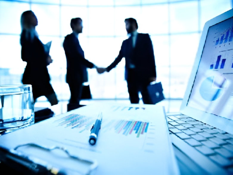 Diverse team reviewing documents with world map for PRO compliance services in Dubai blog