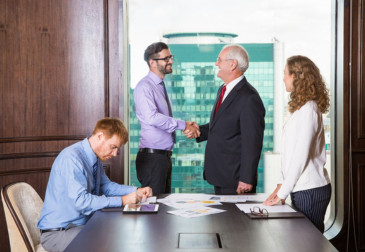 Business consultants reviewing documents in Dubai