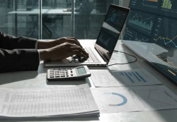 Business professional organising accounting records and invoices