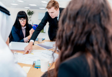 Business consultant assisting entrepreneurs with company formation and licensing procedures in Dubai